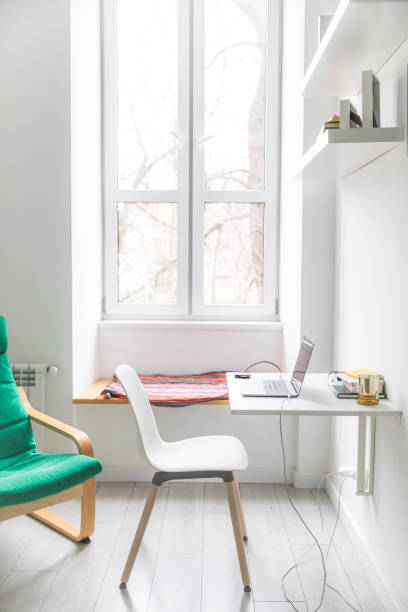 istock Workspace white room - working with laptop at home 1201185835