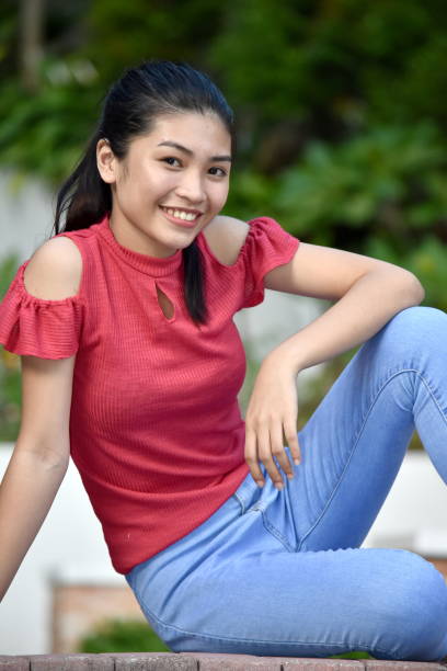istock A Relaxing Cute Filipina Youngster 1201186171