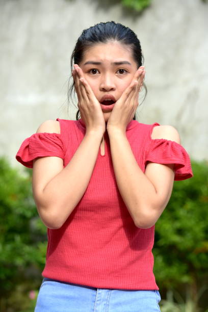 istock A Startled Youthful Diverse Girl 1201191945