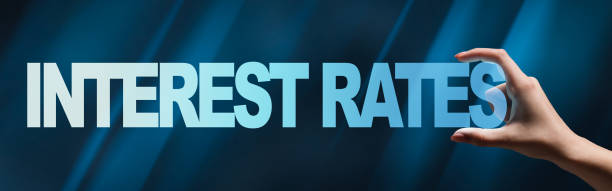 Female hand holding interest rates description over blue abstract background, panorama