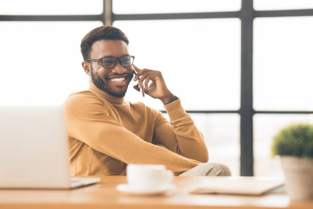 istock Happy afro student talking on the phone 1201192197