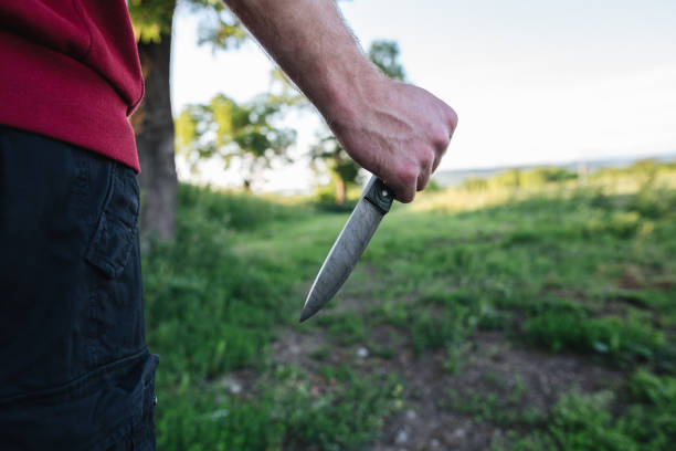 istock Dangerous man with knife in his hand 1201192574
