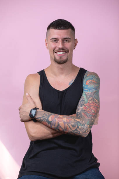istock Confident carefree young tattoed man 1201193554
