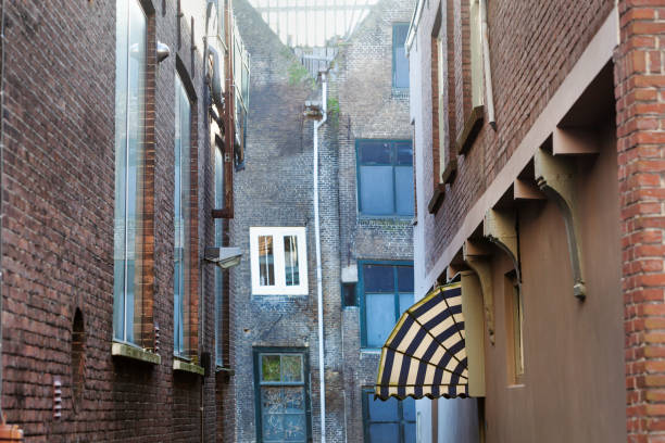 Old small vintage street with side entry with awning