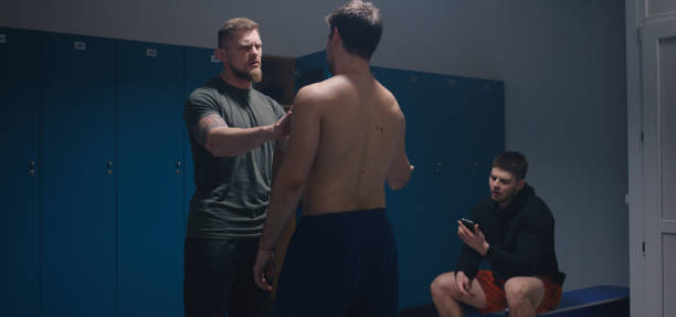 istock Young man bullied in changing room 1201198553