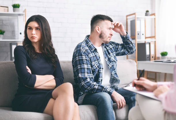istock Offended spouses not talking to each other at marital therapy 1201198696