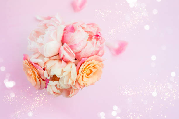istock Fresh bunch of pink peonies and roses 1201199483
