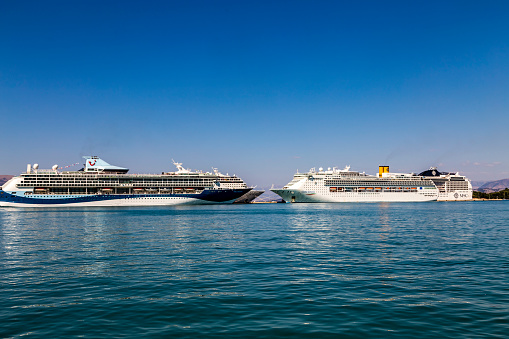 Corfu, GREECE, September, 2018. Big cruise ship liners Marella Discovery and Costa Victoria docked at the cruise terminal of the Kerkyra, Corfu, Greece