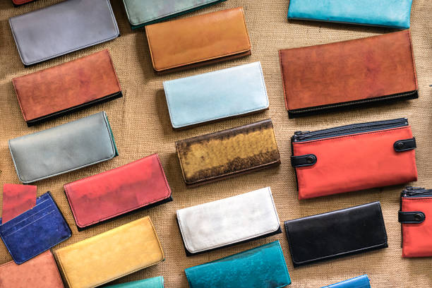 Group of leather wallets in different colours, top view.