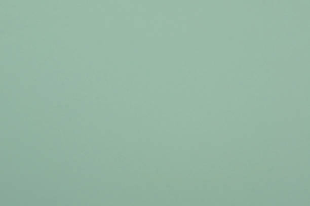 istock Light green paper abstract background. Close-up, paper texture 1201207453