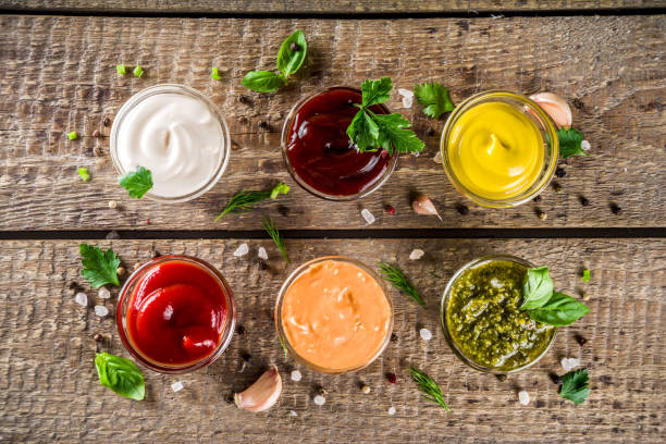 istock Set bowls of various dip and sauces 1201210850