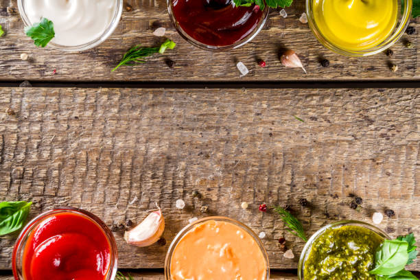 istock Set bowls of various dip and sauces 1201210860