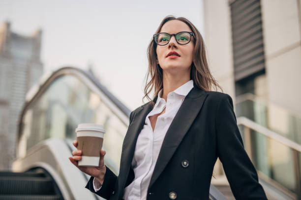 istock Business lady on coffee break in city 1201215271