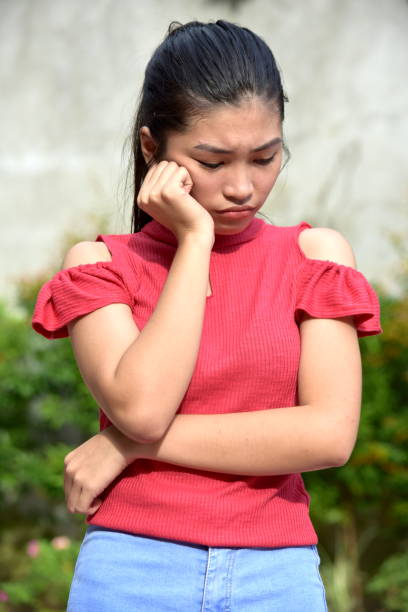 istock An Asian Girl And Depression 1201218627