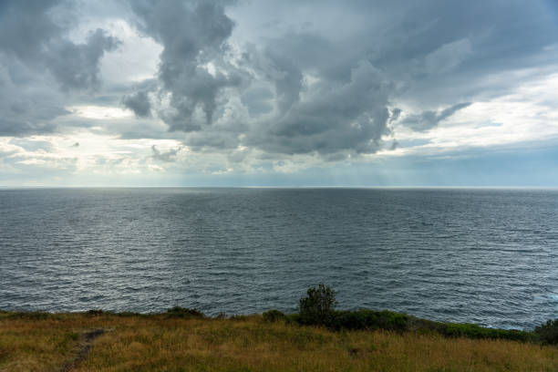 вид на каттегатт с юго-западного побережья швеции - incoming storm стоковые фото и изображения