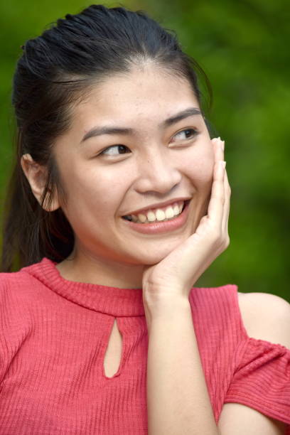 istock A Contemplative Asian Female 1201218919