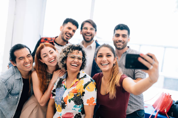 istock Group of friends taking a selfie 1201221588