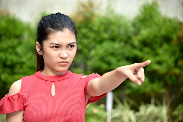 istock A Cute Asian Female And Anger 1201222633
