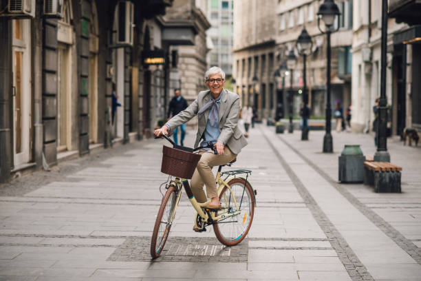 istock Senior woman enjoying biking 1201223013