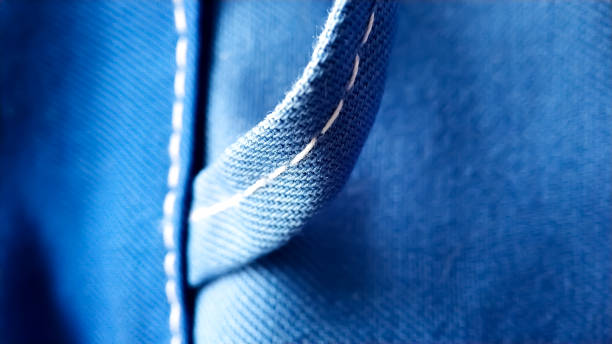 istock Loop on blue work clothes. workwear close-up macro seam, screed, texture 1201225471