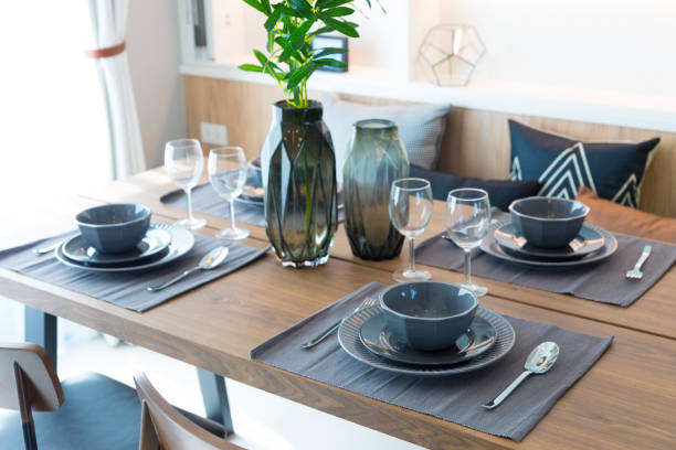 istock Modern dinning room interior with grey plate on wood table 1201225568
