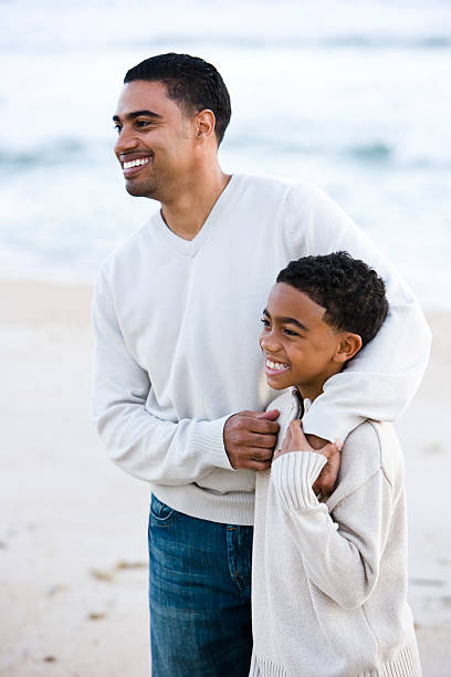 istock Father and son at the beach 120122637