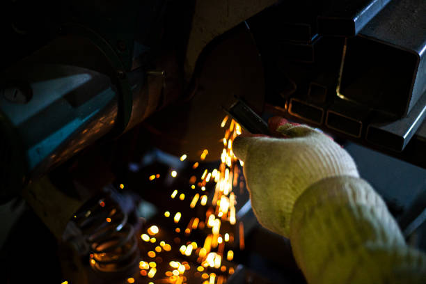 istock Metal processing. Metal cutting with a saw. 1201226499