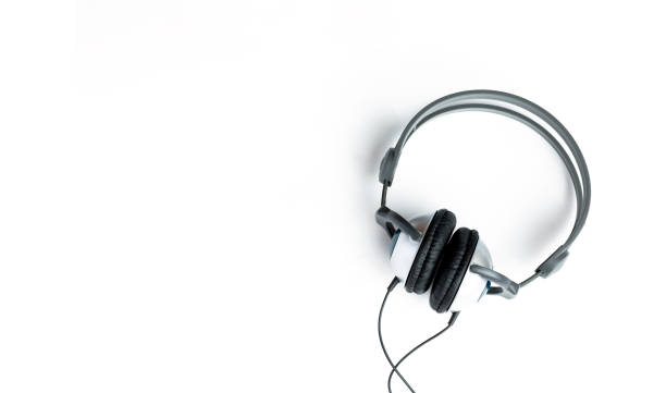 istock Kids headphones in gray and black on white background. learning foreign languages 1201227287