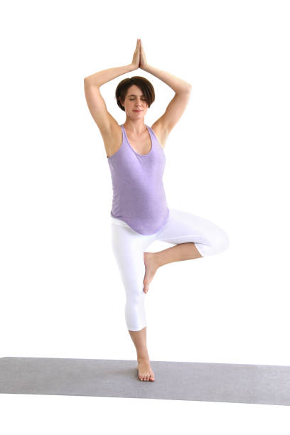 istock Pregnant woman does yoga in the studio 1201229171