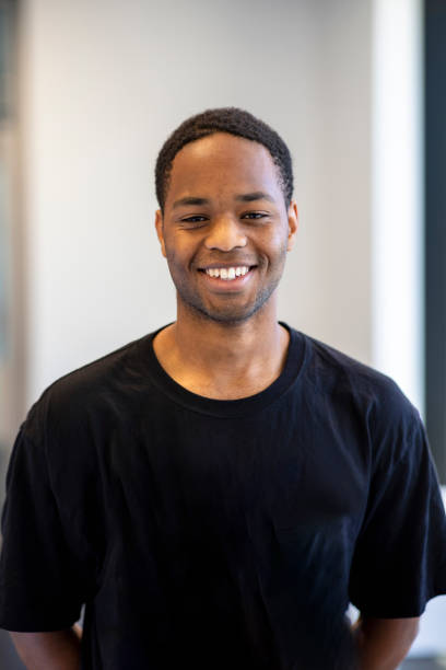 istock Happy Young Confident Man Smiling at Camera 1201229488