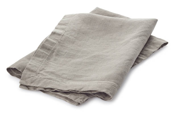 istock Folded light grey cotton napkin isoin 1201231389
