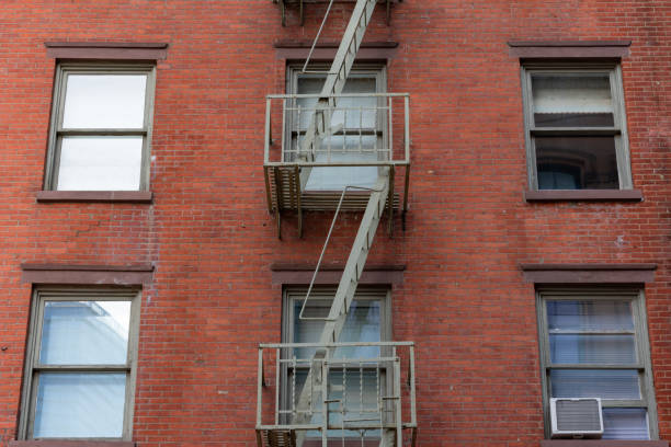 istock Small Window Fire Escape on a Brick Building in Tribeca New York 1201236786
