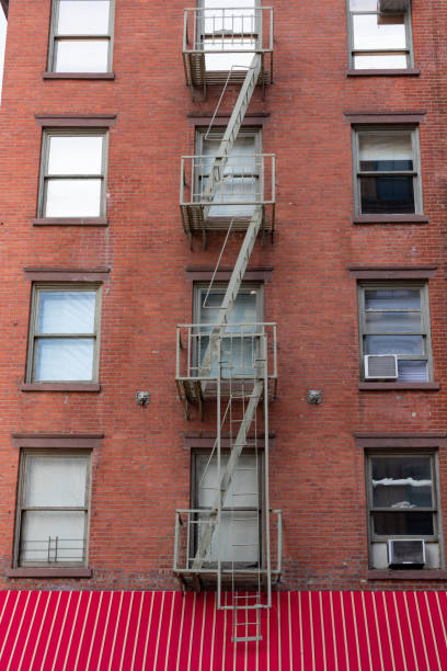 istock Small Window Fire Escape on a Brick Building in Tribeca New York 1201236794