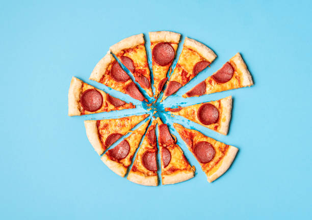 istock Sliced pizza salami. Pizza pepperoni slices. Homemade dinner 1201237729
