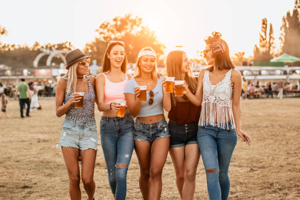 Female friends having fun at music festival Female friends having fun at music festival 3686 stock pictures, royalty-free photos & images