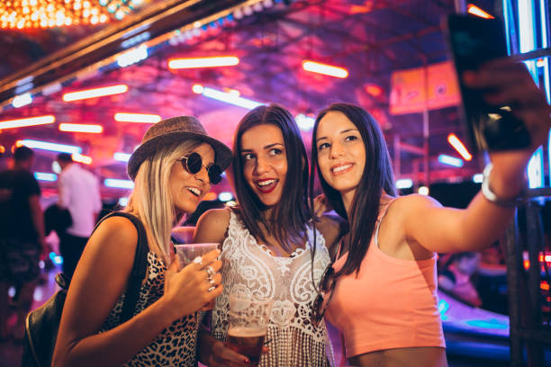 Girls having fun and taking selfie in the amusement park Girls having fun and taking selfie in the amusement park 3686 stock pictures, royalty-free photos & images