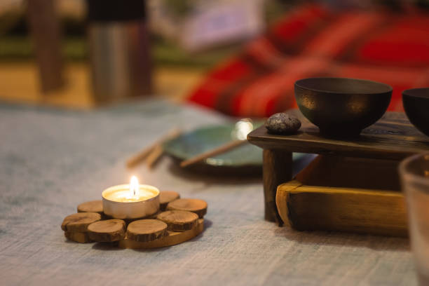 istock candle and incense near workplace and laptop 1201251596