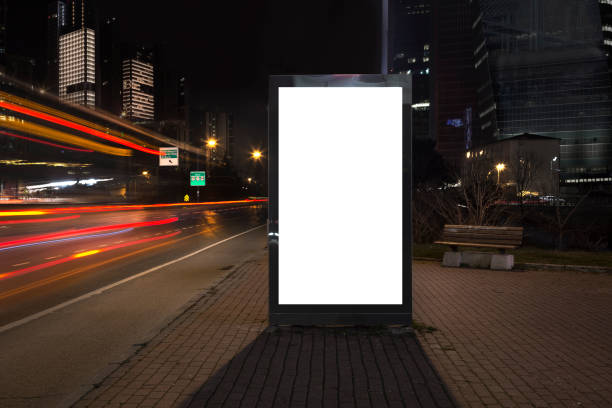 Blank billboard in night traffic Blank billboard in night traffic banner commercial sign outdoors marketing stock pictures, royalty-free photos & images