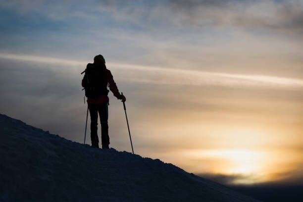 istock A mountaineer skier watches the sun go down 1201257193