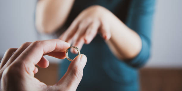 istock man and happy woman hand ring 1201257423