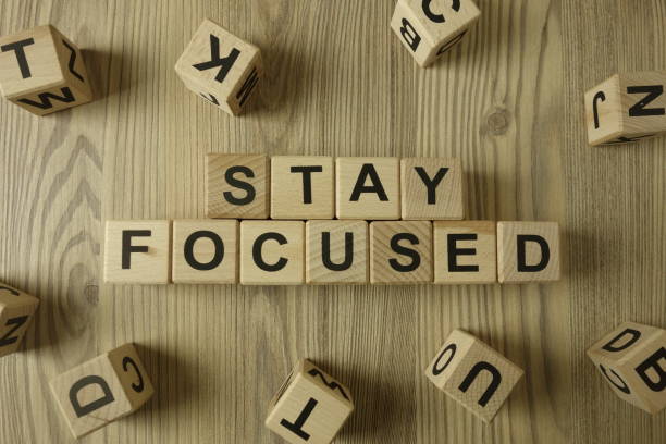 istock Text stay focused from wooden blocks on desk 1201258790