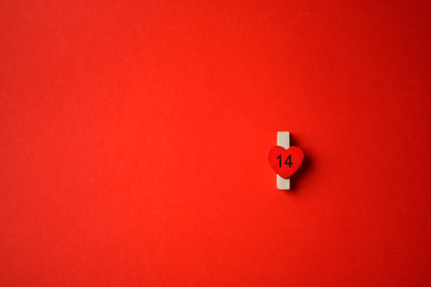 istock St. Valentine's Day. Wooden clothespin with a heart. 1201259896