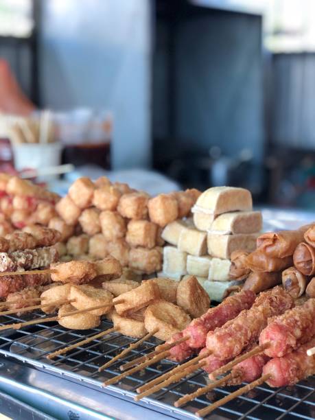 Fried sausages and deep-fried, meatballs,chicken meat, tofu are easy to eat but not high in carbohydrates and fats in market. Thai street food in Thailand.
