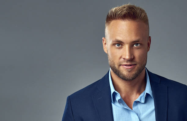 istock Handsome man in navy blue suit 1201262224