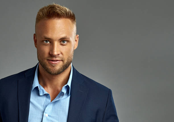 istock Handsome man in navy blue suit 1201262229