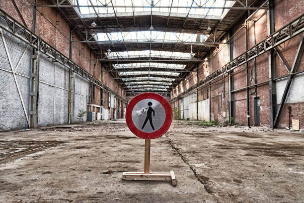 Warehouse with no people sign stock photo