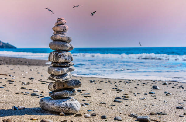 Meditation Rock Stack on a Beach on the Southern Mediterranean Sea at Sunrise