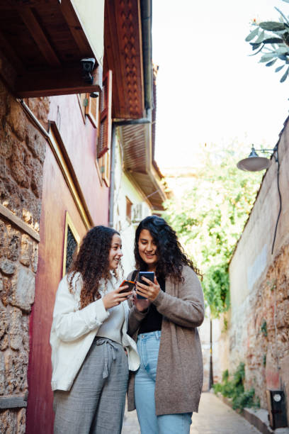 istock Teenager looking smart phone 1201268628