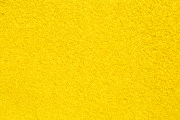 istock Grungy yellow background. Colored material for decoration. 1201273472
