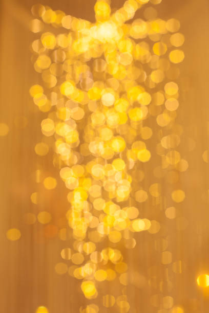 istock Abstract Christmas light bokeh glitter glowing backdrop background 1201274217